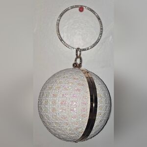 White and Gold Textured Spherical And Wrislet Purse